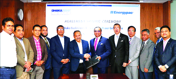 Syed Mahbubur Rahman, Managing Director of Dhaka Bank and Engr Nurul Aktar, Director of Energypac Group, exchanging an agreement signing documents at the Bank's Corporate Office in the city on Sunday. Bank's DMDs Shakir Amin Chowdhury, A K M Shahnawaj,