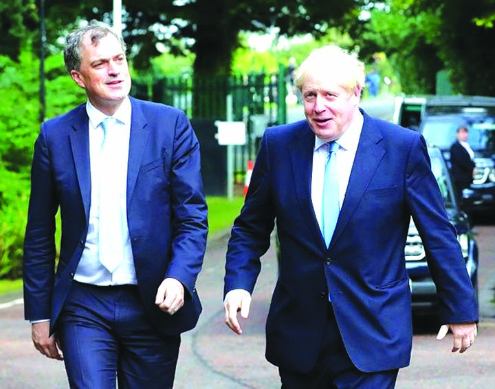 Johnson (Right) was accompanied by Britain's Northern Ireland Secretary Julian Smith (L) on his visit to Belfast.