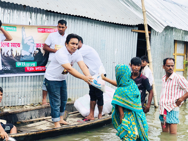 Convener of Joy Bangla Young Foundation, Salauddin Shikder distributed dry food as relief among four hundred flood affected people of Balaspur Union under Mymensingh district recently. Ex- Assistant Secretary of BCL Alamgir Hossain, among others, were pre