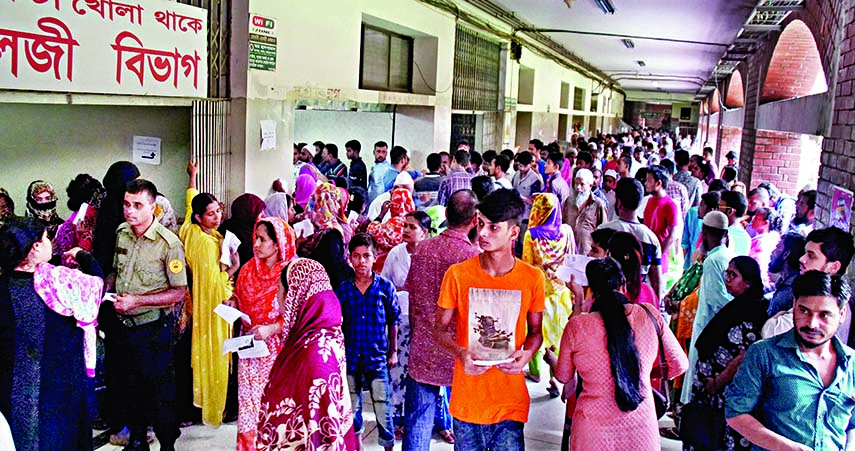 Panic-stricken people are rushing to pathology labs in city's hospitals and diagnostic centres for dengue test adding to hospitals and medical centres. This photo was taken from the Shaheed Suhrawardy Medical College Hospital on Saturday.