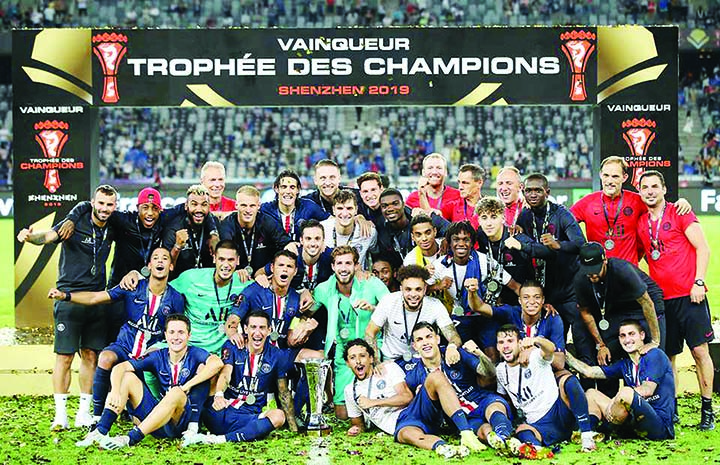 PSG players celebrate after defeating Rennes to win the French Super Cup in Shenzhen, China on Saturday.