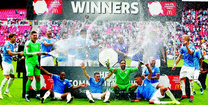 Manchester City players celebrate winning the FA Community Shield at the Wembley Stadium in London on Sunday.