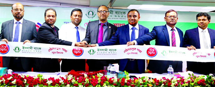 Md. Mahbub ul Alam, Managing Director of Islami Bank Bangladesh Ltd, inaugurating its shifted Daulatpur branch at Upper Jessore road in Daulatpur in Khulna recently. Muhammad Qaisar Ali, AMD, Abu Reza Md. Yeahia and Md. Abdul Jabbar, DMDs, among others, w