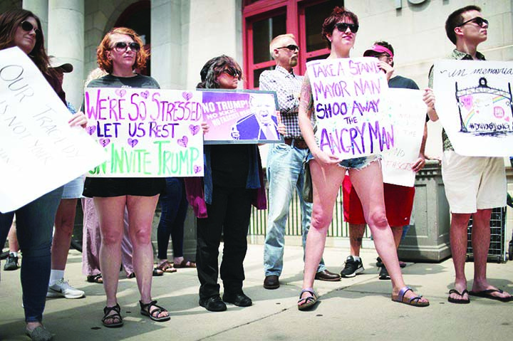 Demonstrators outside of the Dayton City Hall protest a planned visit of President Donald Trump on August 06, 2019 in Dayton, Ohio. Trump is scheduled to visit the city on Wednesday as residents recover from Sunday Morning's mass shooting in the Oregon