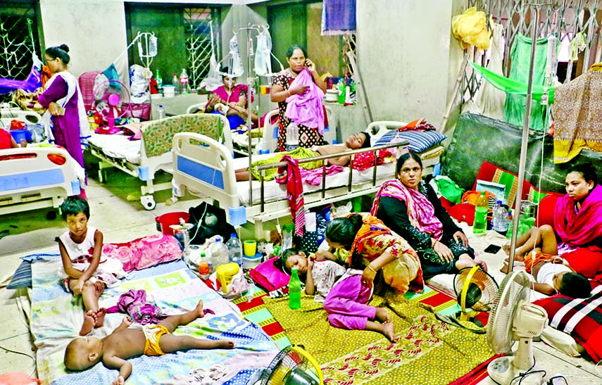 Relatives stay with the Dengue patients at the hospitals to take whole-time care of the victims, attended those even flooring. This photo was taken from Suhrawardy Hospital on Wednesday.