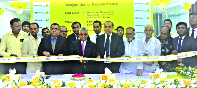 Nizam Chowdhury, Chairman, Syed Habib Hasnat, Managing Director of NRB Global Bank Limited, inaugurating its new branch at Kapasia in Gazipur recently. Divisional Heads of the bank and local elites were also present.