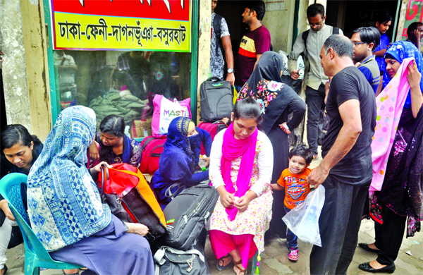Home-bound passengers wait for hours for transport three days ahead of the holy Eid -ul-Azha. The snap was taken from the city's Manik Nagar Bishwa Road Bus Counter on Friday.