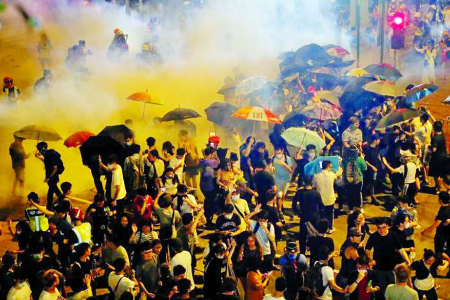 Police fire tear gas into a crowd: After nearly 10 weeks of unrest, the Hong Kong demonstrations have become increasingly tense and volatile.