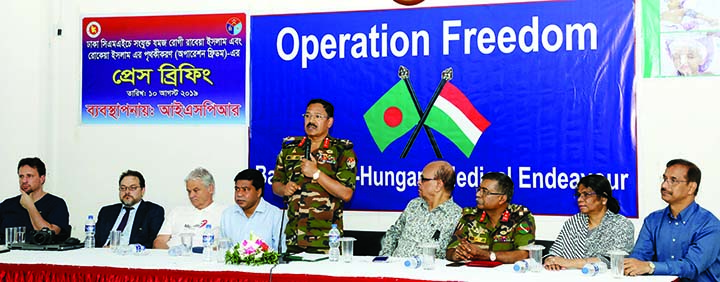 Doctors of Combined Military Hospital, Dhaka at a prÃ¨ss briefing on separated conjoined twin at the conference room of the hospital on Saturday. ISPR photo