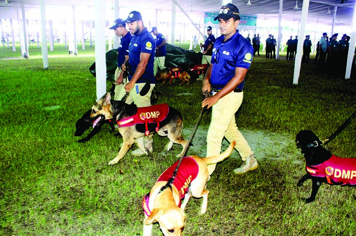 Special security team of DMP scanning the premises of National Eidgah with dog squad on Saturday for security measures ahead of Eid Jamaat.