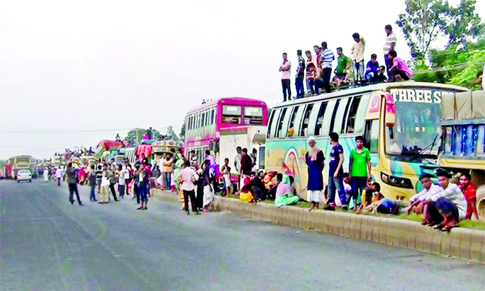 Thousands of Eid holidaymakers face immense sufferings as 75-km long tailback was created on Dhaka-Tangail Highway on Saturday. This photo was taken from Tangail's Alenga area.