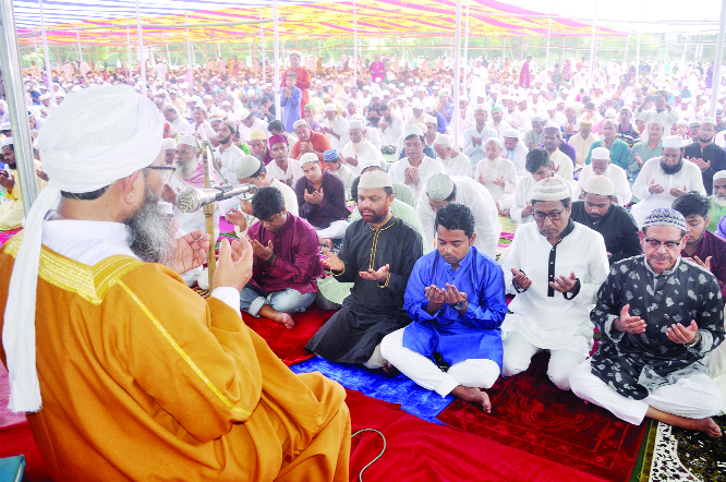 BOGURA: Muslims offering Munajat at the main Eid congregation at Central Eidgah at Sutrapur in Bogura on Monday.