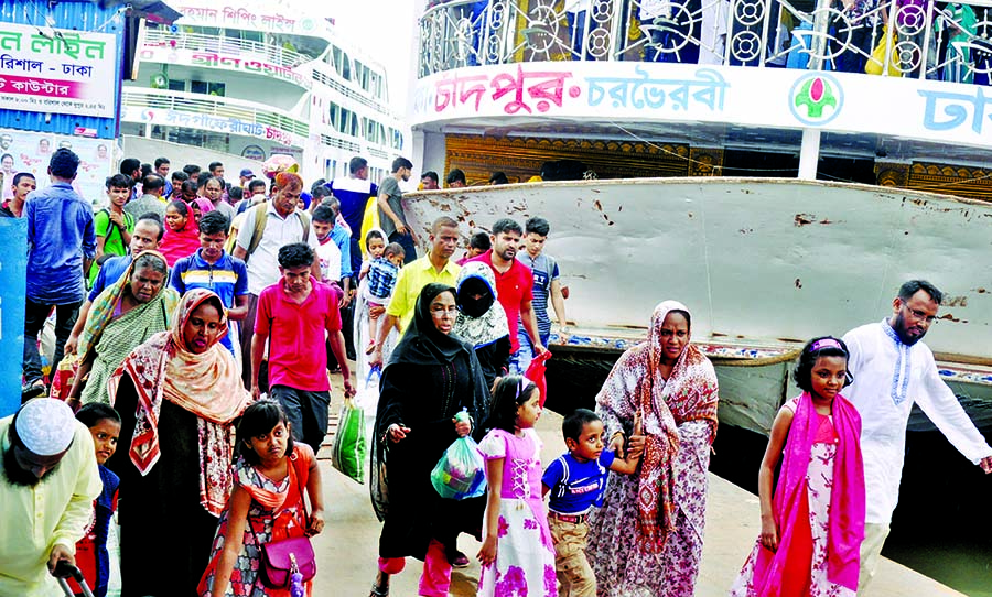 People continued to return to the capital city after celebrating Eid-ul-Azha from their hometowns and villages. This photo was taken from Sadarghat Launch Terminal on Thursday.