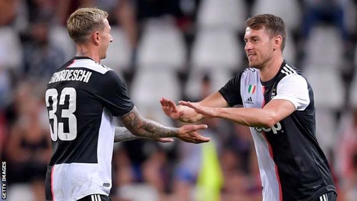 Aaron Ramsey (right) comes on in place of Federico Bernardeschi to make his Juve debut against Serie C side Triestina in their final pre-season friendly at Milan on Saturday.