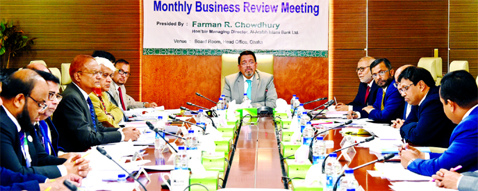 Farman R Chowdhury, Managing Director of Al-Arafah Islami Bank Limited, presiding over its 'Monthly Business Review Meeting' at its head office in the city on Monday. Md. Fazlul Karim, S M Jaffar, Mohammed Zubair Wafa, Shabbir Ahmed and Md. Shafiqur Rah