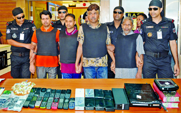 Four members of militant group 'Allahar Dal' were arrested by RAB-3 with mobile phone and some devices from city's Hatirjheel area. This photo was taken from RAB Media Centre on Monday.