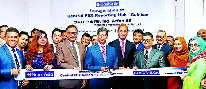 Md. Arfan Ali, Managing Director of Bank Asia Limited, inaugurating its Reporting Hub to ensure automated reporting of foreign trade related transactions for secured customer service at Tejgaon Link Road branch of the bank in the city on Tuesday. Mohammad