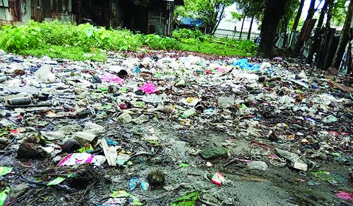 PATUAKHALI: Piling of garbage are seen infront of staff quarter of Kalapara Land Office. This snap was taken on Monday.