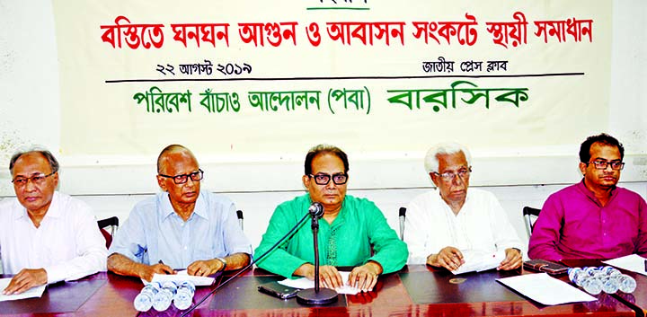 Chairman of Save The Environment Movement Abu Naser Khan speaking at a dialogue on 'Fire in Slums and Permanent Solution of Residential Crisis' at the Jatiya Press Club on Thursday.