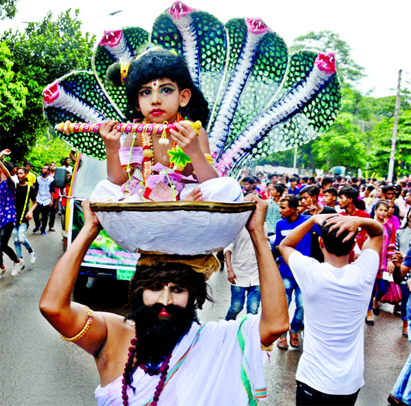 Bangladesh Puja Udjapon Parishad brought out a rally in the city on Friday on the occasion of Sri Krishna's Janmastami. The snap was taken from in front of the High Court .