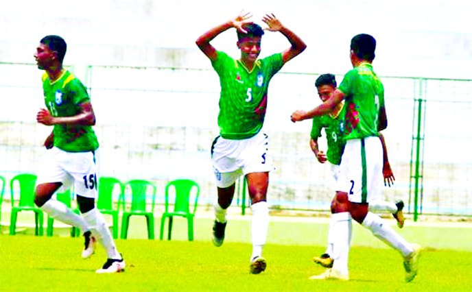 Players of Bangladesh Under-15 Football team celebrating after scoring a goal against their counterpart Bhutan Under-15 Football team in their opening match of the SAFF Under-15 Championship at Kalyani Stadium in Kolkata, West Bengal on Friday.