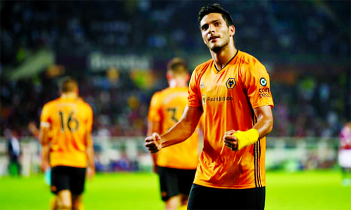 Raul JimÃ©nez celebrates scoring Wolves' third goal in their 3-2 victory against Torino in their Europa League Football match at Torino on Thursday.