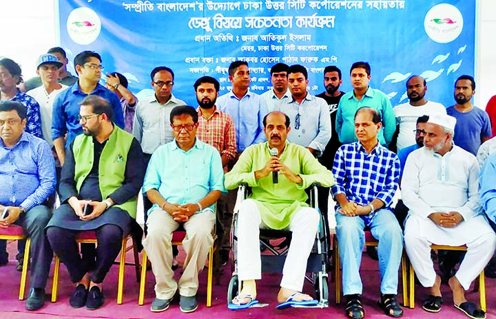 DNCC Mayor Md Atiqul Islam speaking as Chief Guest at an dengue awareness programme organised by Sampreeti Bangladesh in front of Gulshan No 2 DNCC Market yesterday. BSS photo