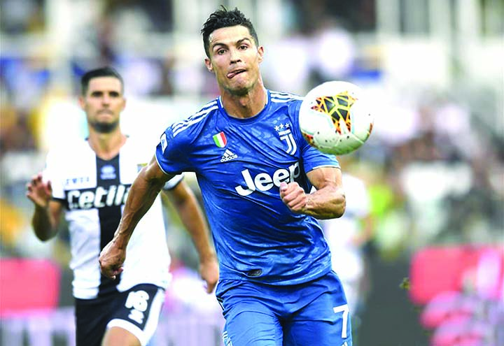 Juventus' Cristiano Ronaldo competes during the Serie A soccer match between Parma and FC Juventus in Parma, Italy on Saturday.
