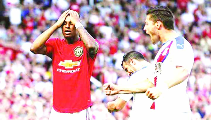 Manchester United's Marcus Rashford reacts after missing a penalty against Crystal Palace during the Premier League match at the Old Trafford in Manchester on Saturday.