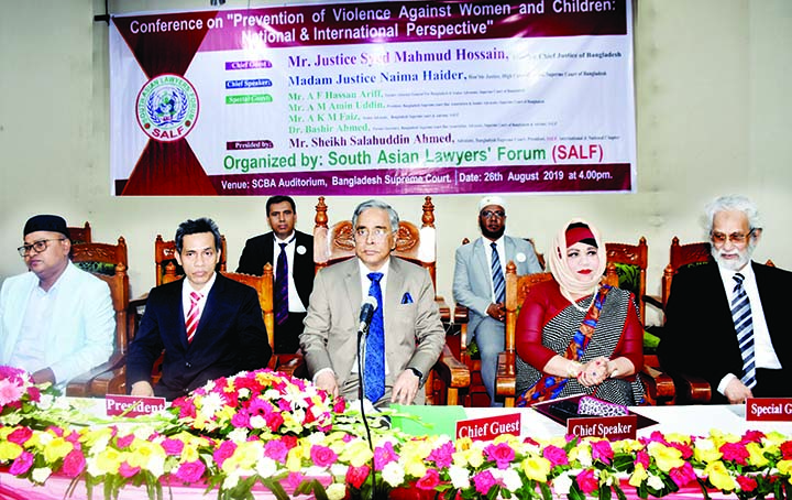 Chief Justice Syed Mahnud Hossain speaking at a conference on 'Prevention of Violence Against Women and Children: National and International Perspective' organised by South Asian Lawyers Forum in the auditorium of Supreme Court Bar Association on Monday