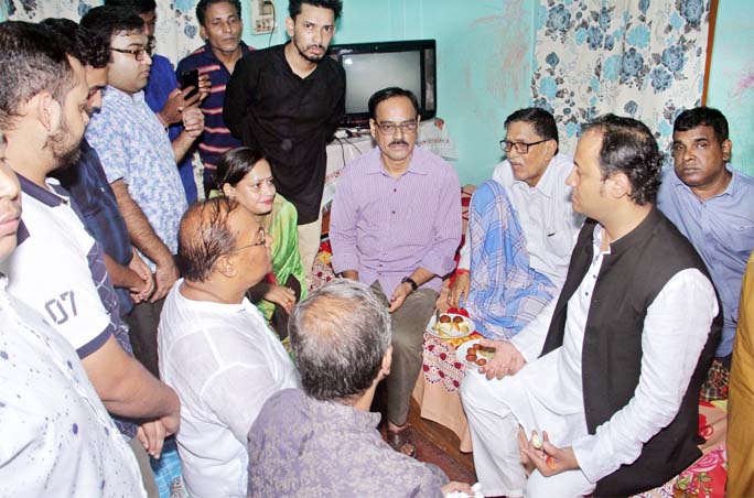Deputy Education Minister Barrister Mohibul Hasan Chowdhury Nowfel visiting ailing Awami League leader Gourango Chandra Ghosh at his residence recently.
