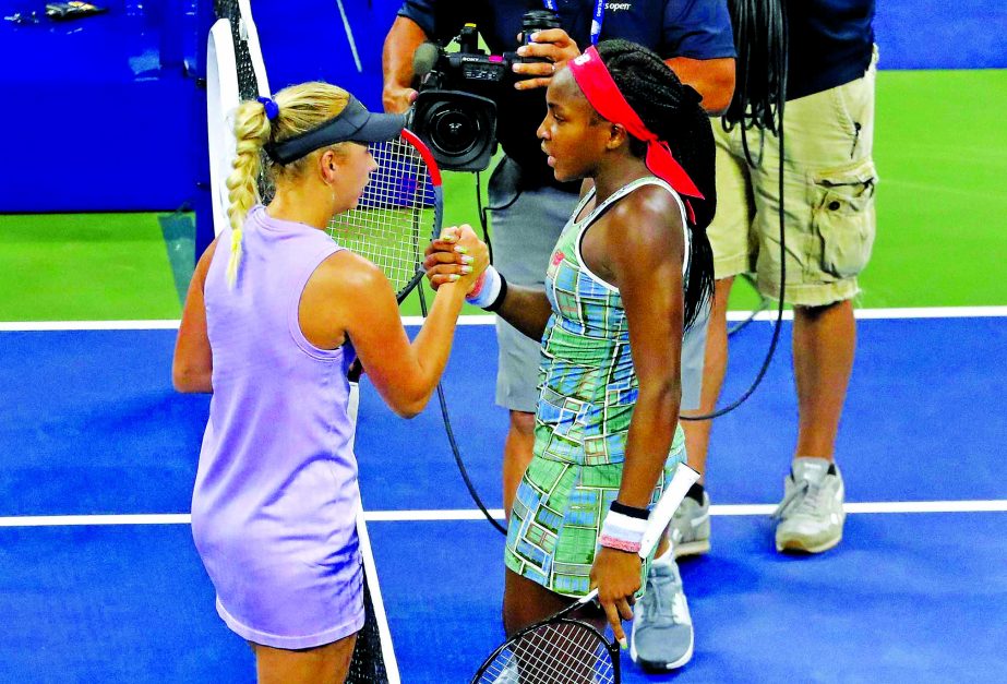 Coco Gauff of the United States (right) greets Anastasia Potapova of Russia, after winning their first round match of the US Open tennis tournament in New York on Tuesday.