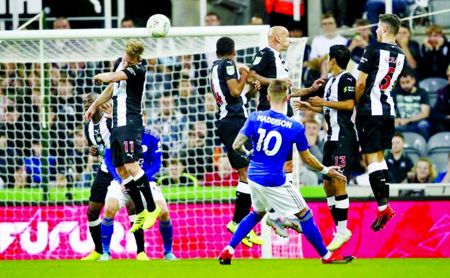 Leicester City's James Maddison scores his side's first goal of the game during their English League Cup Second Round soccer match against Newcastle at St James' Park, Newcastle, England on Wednesday.