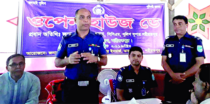 DAMUDYA (Shariatpur): Abdul Momen, SP, Shariatpur speaking at a discussion meeting marking the Open House Day as Chief Guest yesterday.