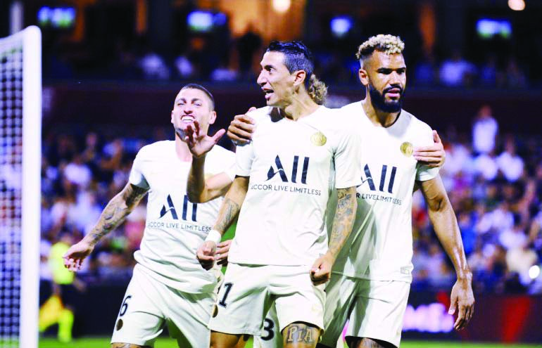 PSGâ€™s Argentinian midfielder Angel Di Maria (center) celebrates with teammates after scoring a goal during the French L1 football match between Metz and PSG at the Saint-Symphorien stadium in Longeville-les-Metz, eastern France on Friday.