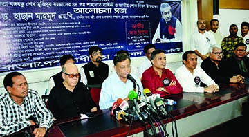 Information Minister Dr Hasan Mahmud speaking at a discussion organised on the occasion of the 44th martyrdom anniversary of Father of the Nation Bangabandhu Sheikh Mujibur Rahman and National Mourning Day by Bangladesh Swadhinata Parishad at the Jatiya P
