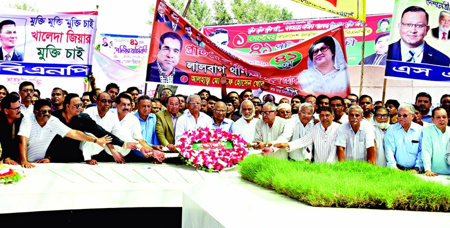 BNP Secretary General Mirza Fakhrul Islam Alamgir along with leaders of the party placing wreaths at the grave of former President Ziaur Rahman marking the 41st founding anniversary of the Party yesterday.