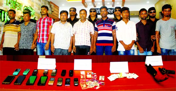 Nine members of snatchers' gang were arrested from Rajoir upazila in Madaripur district and city's separate area by RAB-4 with some mobile phone sets on Sunday.