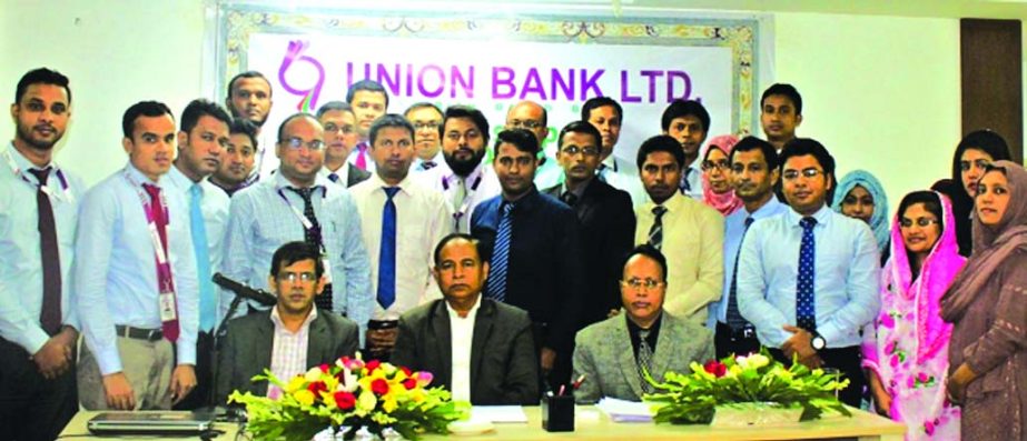 Hasan Iqbal, Deputy Managing Director of Union Bank Ltd, poses for a photograph along with the bank's SVP Idris Ali after attending a day-long workshop on 'Prevention of Money Laundering & Combating Terrorist Financing' at its training institute in the