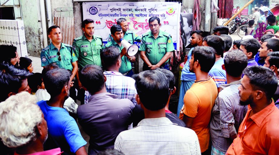 Operation Officer of the city's Bangshal thana Noor Alam speaking at a mass awareness programme in Sat Rawza area on Wednesday with a view to preventing drugs and terrorism.