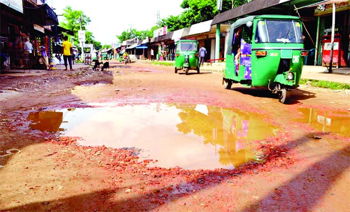 SYLHET: Pedestrians and vehicles movement hampered as the construction work of dilapidated Sylhet- Sultanpur Road yet to be completed after nine months. This snap was taken yesterday.