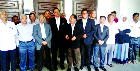 Lawyers brought out a procession on the Supreme Court premises on Wednesday demanding Barrister Mainul Hosein's immediate release.