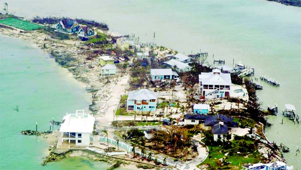 An aerial view of damaged houses seen from a US Coast Guard aircraft in the aftermath of Hurricane Dorian, in Bahamas.
