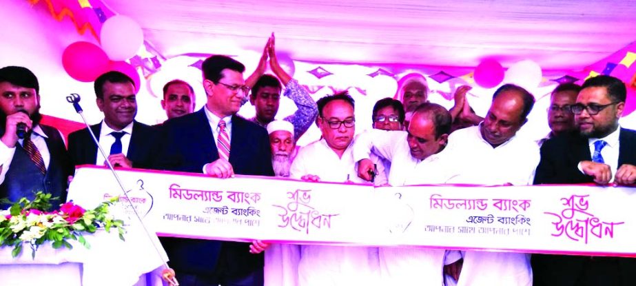 Md Ahsan-uz Zaman, Managing Director of Midland Bank Limited, inaugurating an Agent Banking Centre at Narayanpur Bazarof under Belabo Thana of Narsingdi district recently. Md Moslauddin Khan, Chairman of Narayanpur Union and Md Khairul Hasan, Proprietor o