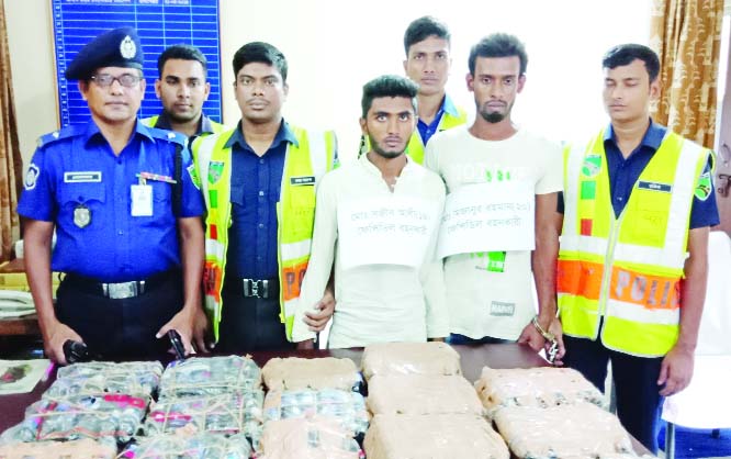 BARAIGRAM (Natore): Two drug traders were arrested with 312 bottles of phensidyl from Baraigram upazila on Friday.