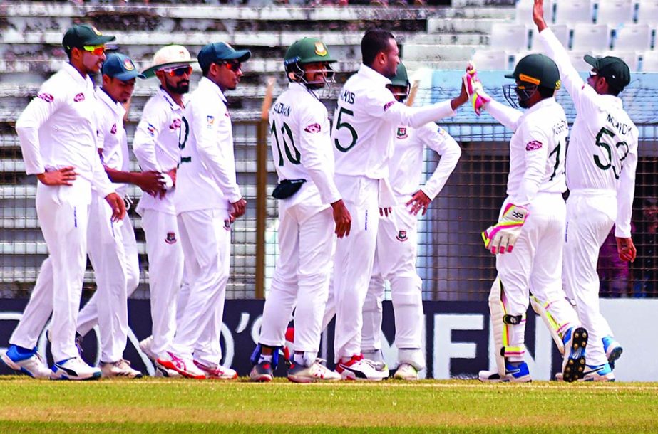 Players of Bangladesh Cricket team, celebrate after dismissal of opener Ihsanullah during the third day of the first Test between Bangladesh and Afghanistan at the Zahur Ahmed Chowdhury Stadium in Chattogram on Saturday.