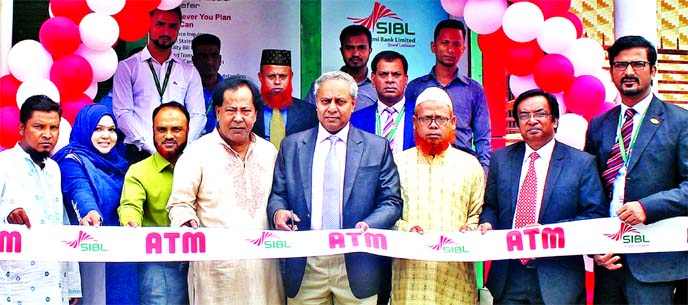 Md Sirajul Hoque, Deputy Managing Director of Social Islami Bank Ltd (SIBL), inaugurating an ATM Booth at Tukerbazar in Sylhet on Saturday. Md Shafiqul Islam, Head of Special Asset Management Division, Mohd Sayed Ali Mahbub Hussain, Industrialist, Md Fazl