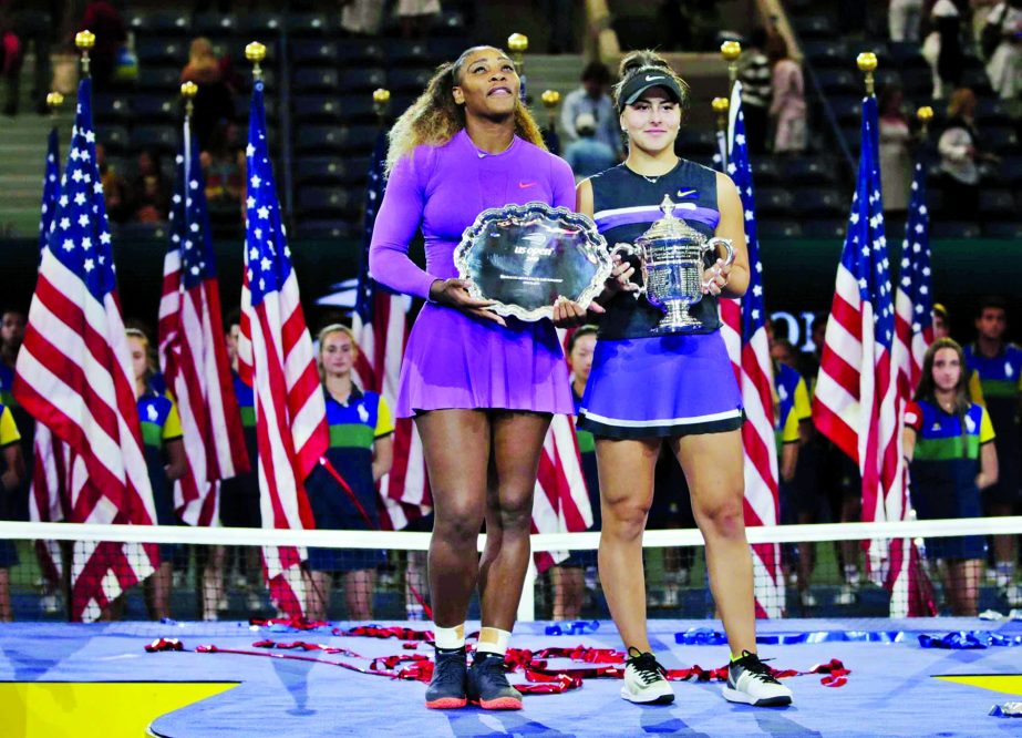 Serena Williams of the United States ( left) and Bianca Andreescu of Canada, pose for photo after Andreescu won the women's singles final of the U.S. Open tennis championships in New York on Saturday.