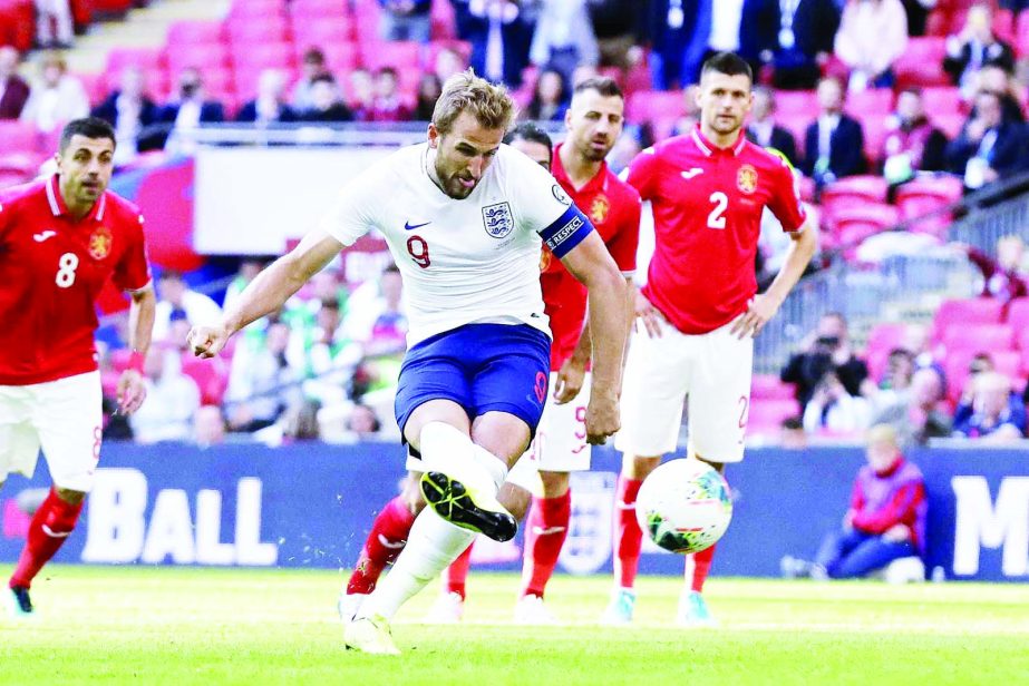 England's Harry Kane scores his side's second goal from the penalty spot during the Euro 2020 group A qualifying soccer match between England and Bulgaria at Wembley stadium in London on Saturday.