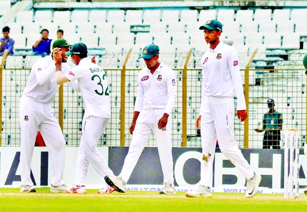 Players of Bangladesh, celebrating after dismissal of Yamin Ahmadzai during the fourth day of the lone Test match between Bangladesh and Afghanistan at the Zahur Ahmed Chowdhury Stadium in Chattogram on Sunday.